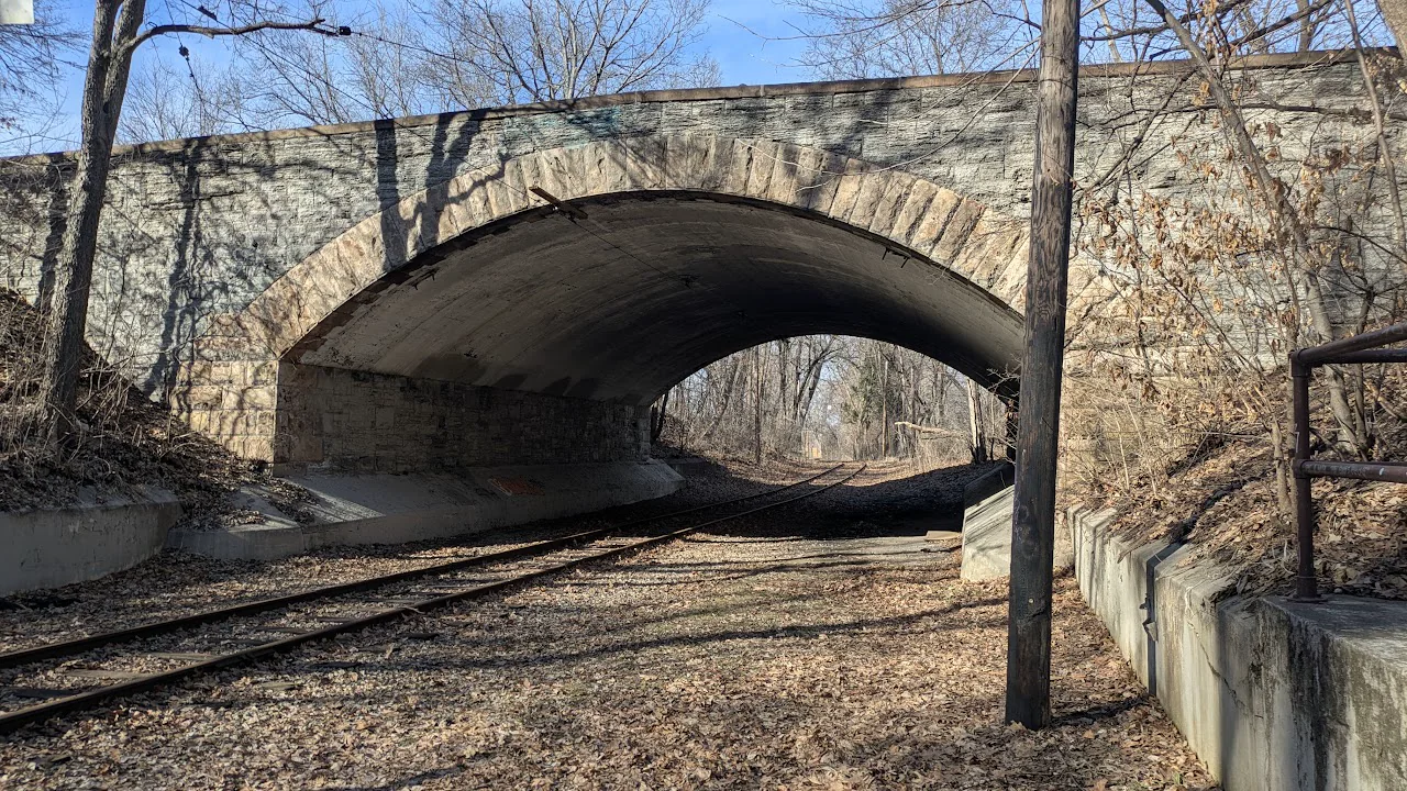 Stone railway bridge along a Minneapolis trail